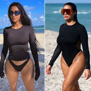 Das ist nicht Kim! Kanyes Neue im Mini-Badeanzug am Strand
