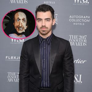 Joe Jonas versteckt sich unter seinem Pullover vor Paparazzi