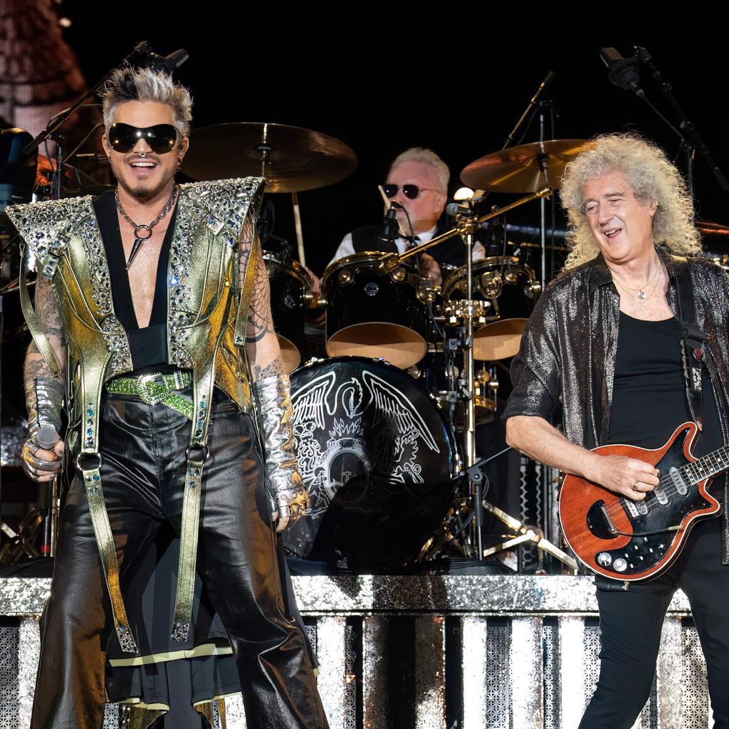 Adam Lambert, Roger Taylor und Brian May bei einem Auftritt von Queen