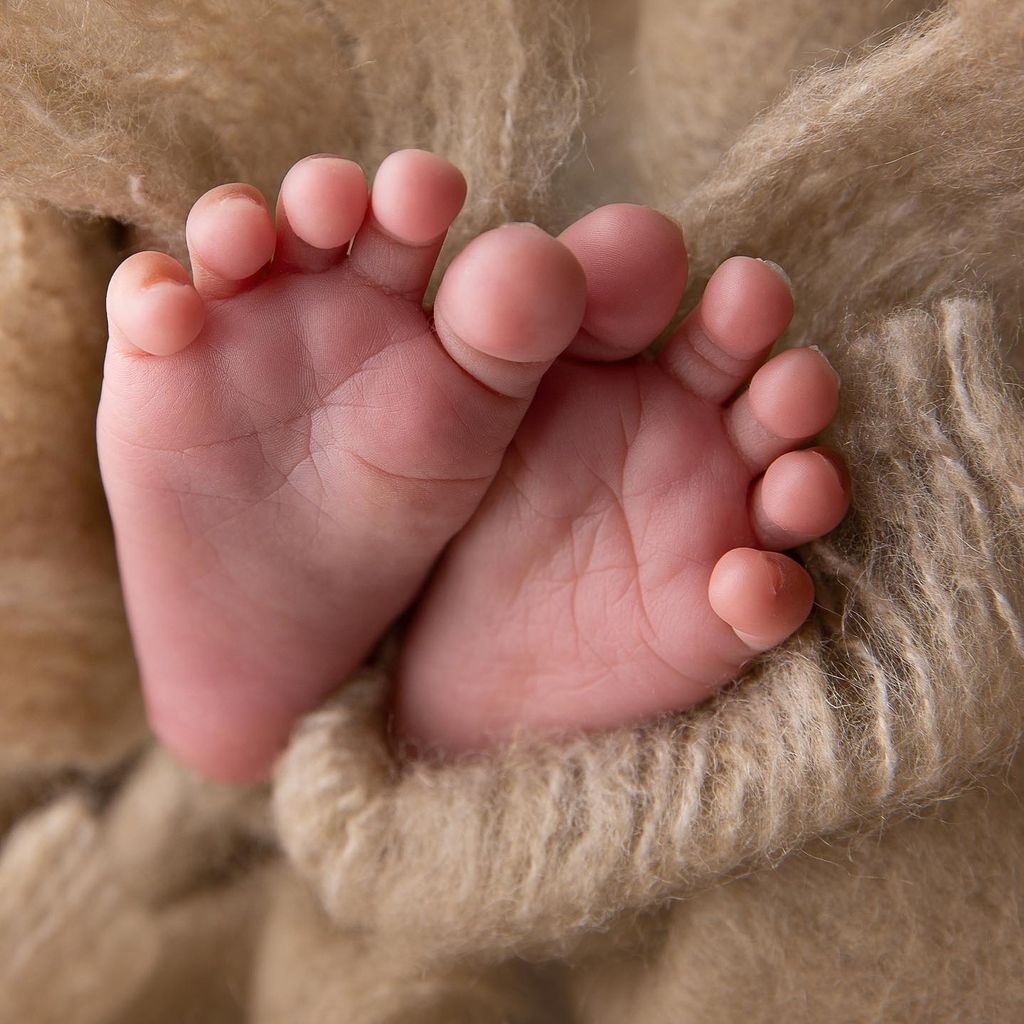 Die Füße von Alexandra Burkes zweitem Baby