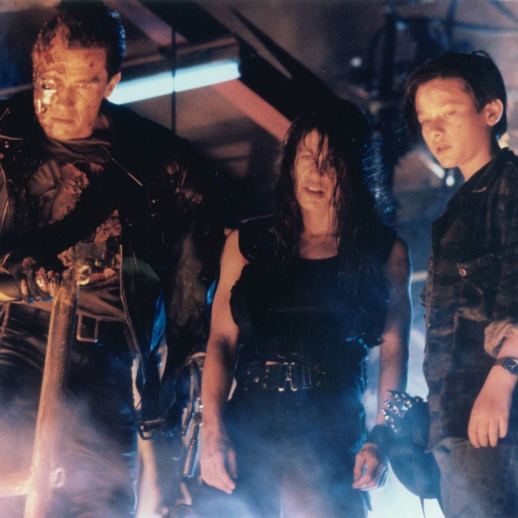 Filmszene aus "Terminator 2: Judgment Day" mit Arnold Schwarzenegger, Linda Hamilton und Edward Furlong, 1991