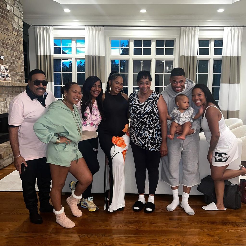 Ashanti und Nelly mit ihren Familien