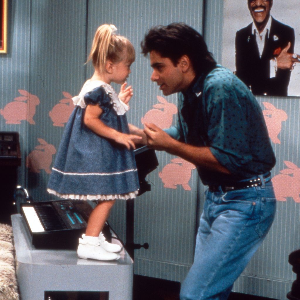 Ashley Olsen und John Stamos in "Full House"