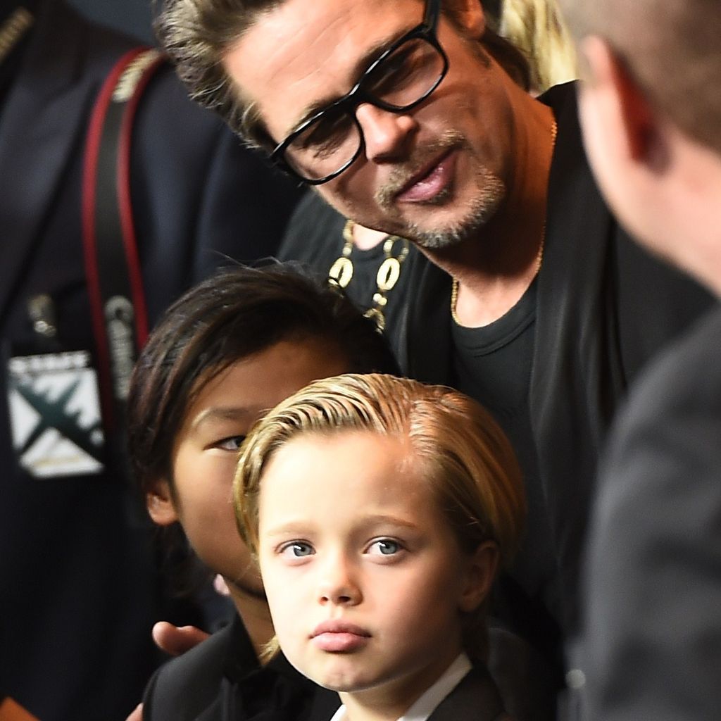 Brad Pitt mit seinen Kindern Pax und Shiloh im Jahr 2014