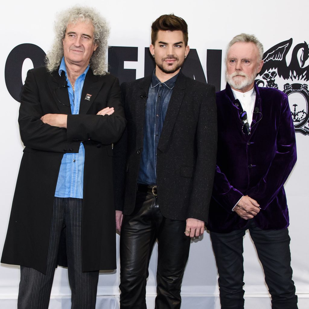 Brian May, Adam Lambert und Roger Taylor bei einem Event in Berlin 2014