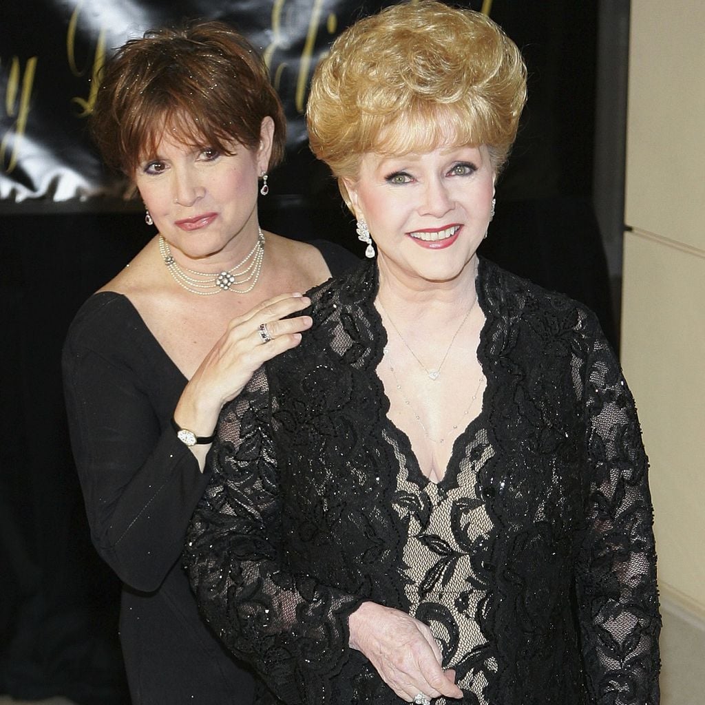 Carrie Fisher und Mutter Debbie Reynolds auf dem 75. Geburtstag von Elizabeth Taylor