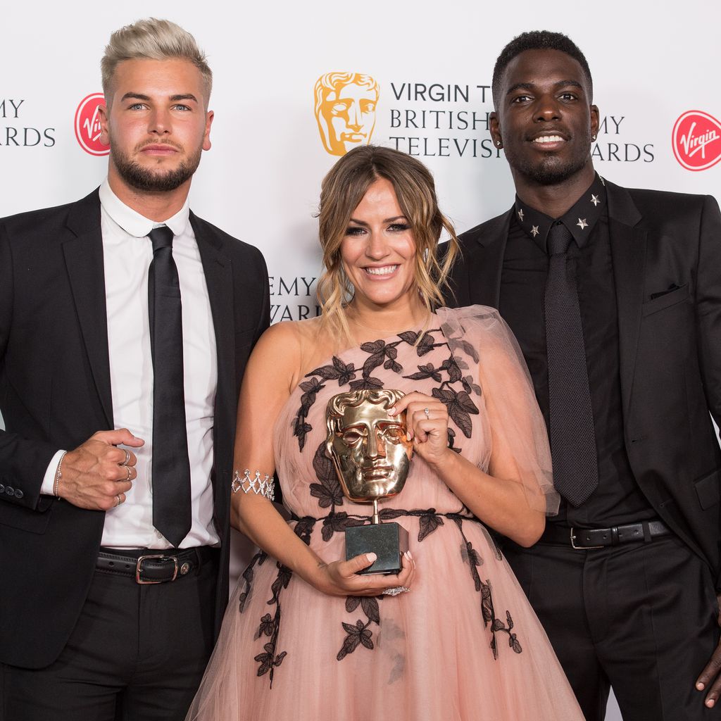 Chris Hughes, Caroline Flack und Marcel Somerville bei den BAFTAs in London im Mai 2018