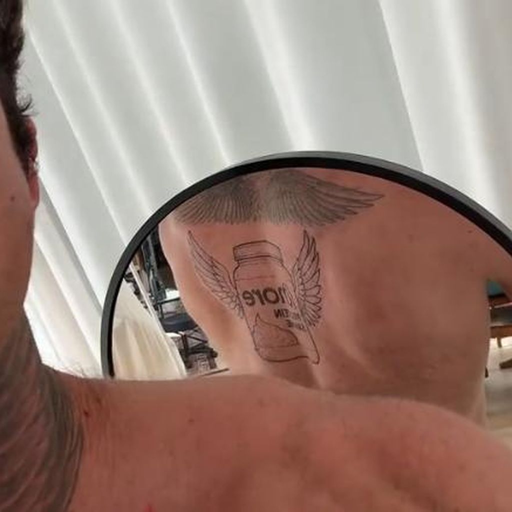 Christian Wolfs Sahne-Protein-Tattoo