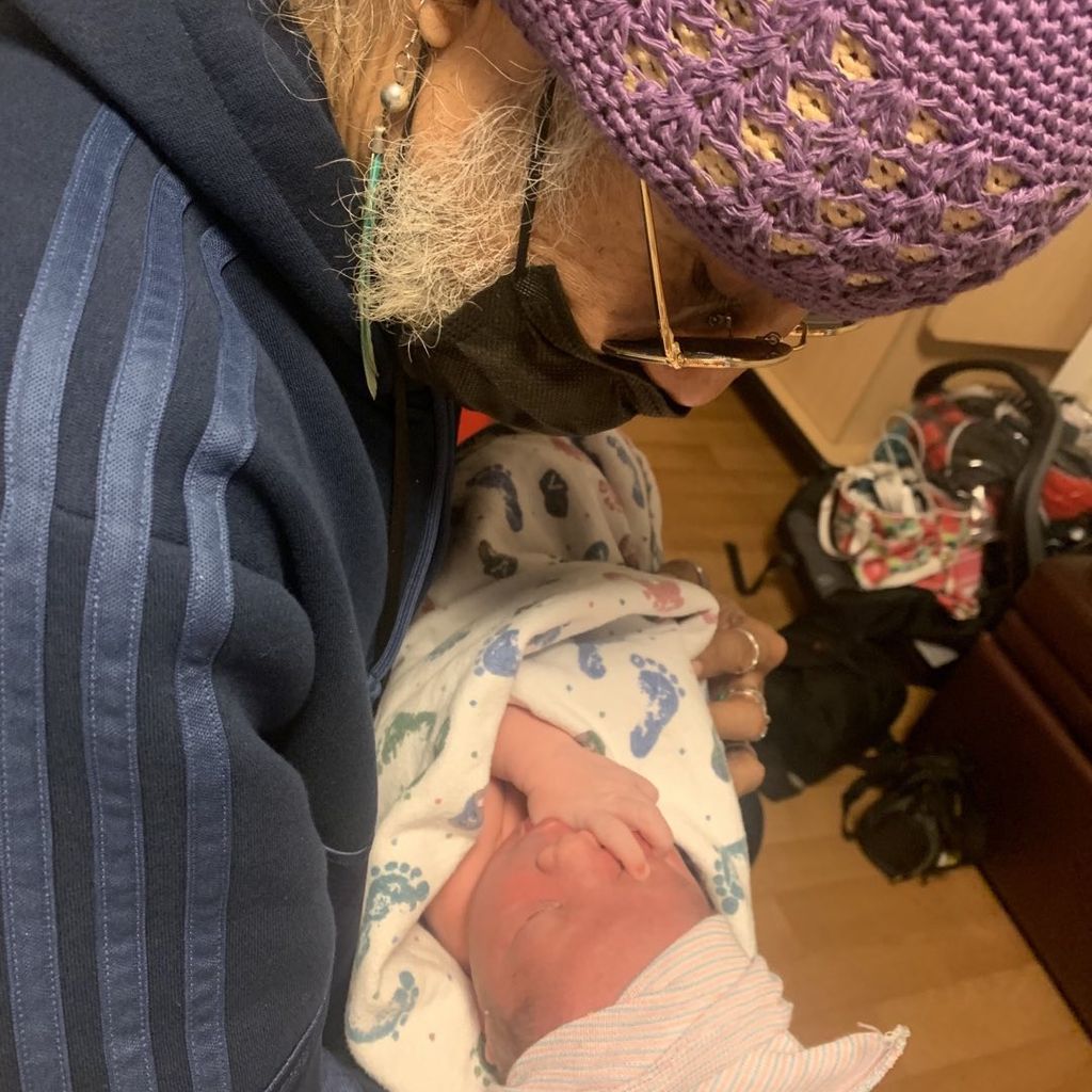 Dr. Karamo Chilombo mit seinem Sohn