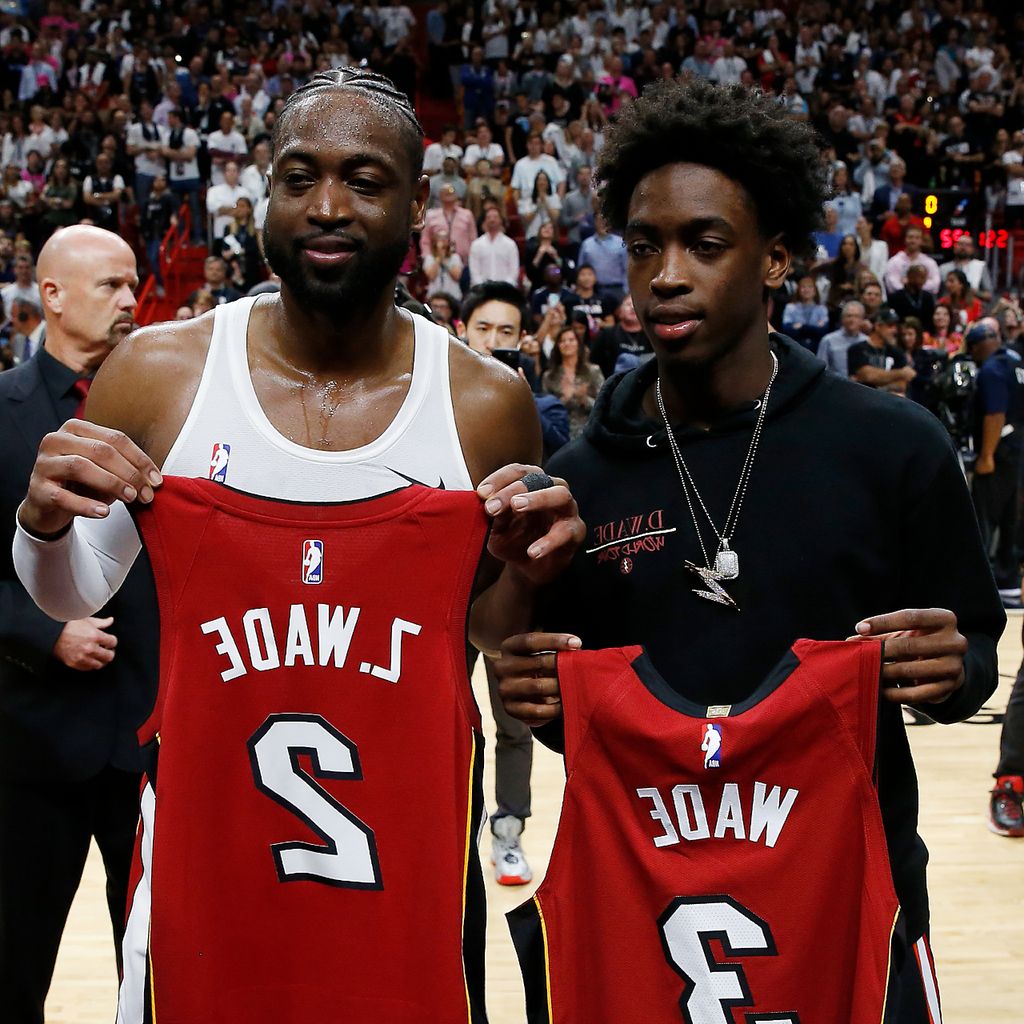 Dwyane und Zaire Wade posieren
