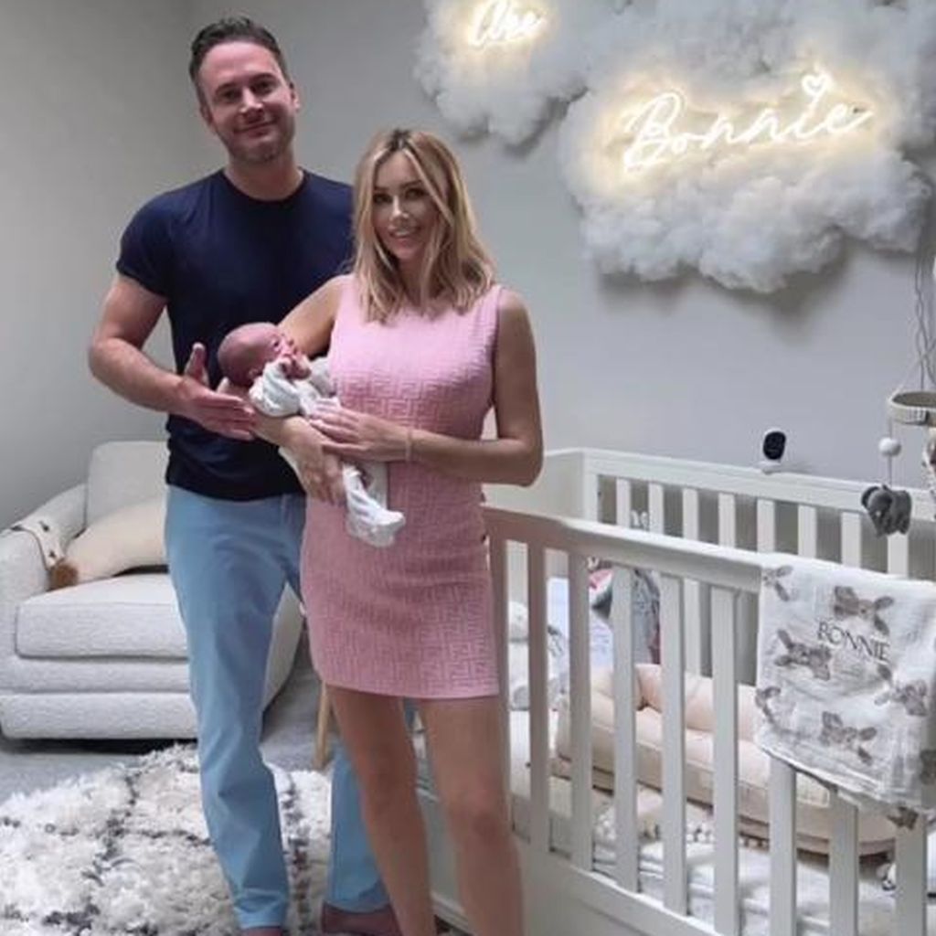 Gary Lucy und Laura Anderson mit ihrer Tochter
