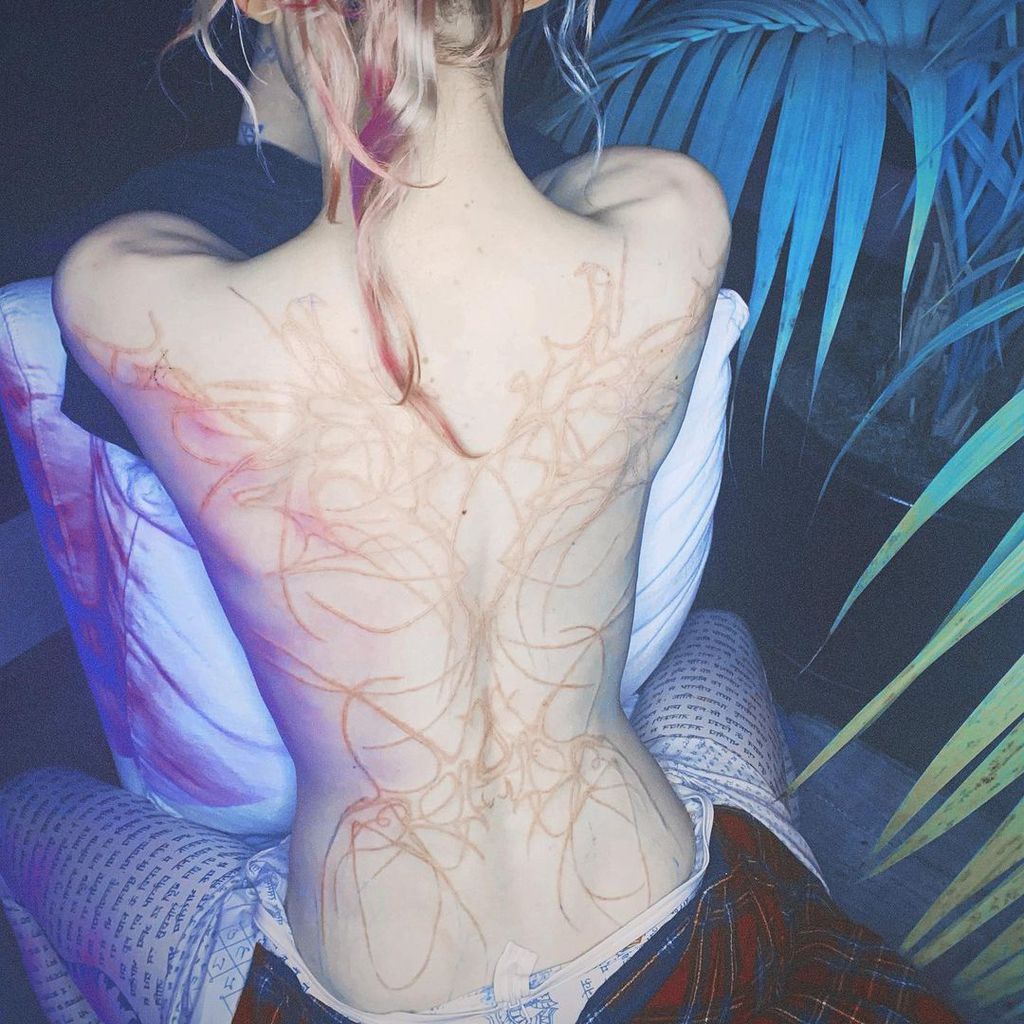 Grimes' Tattoo am Rücken