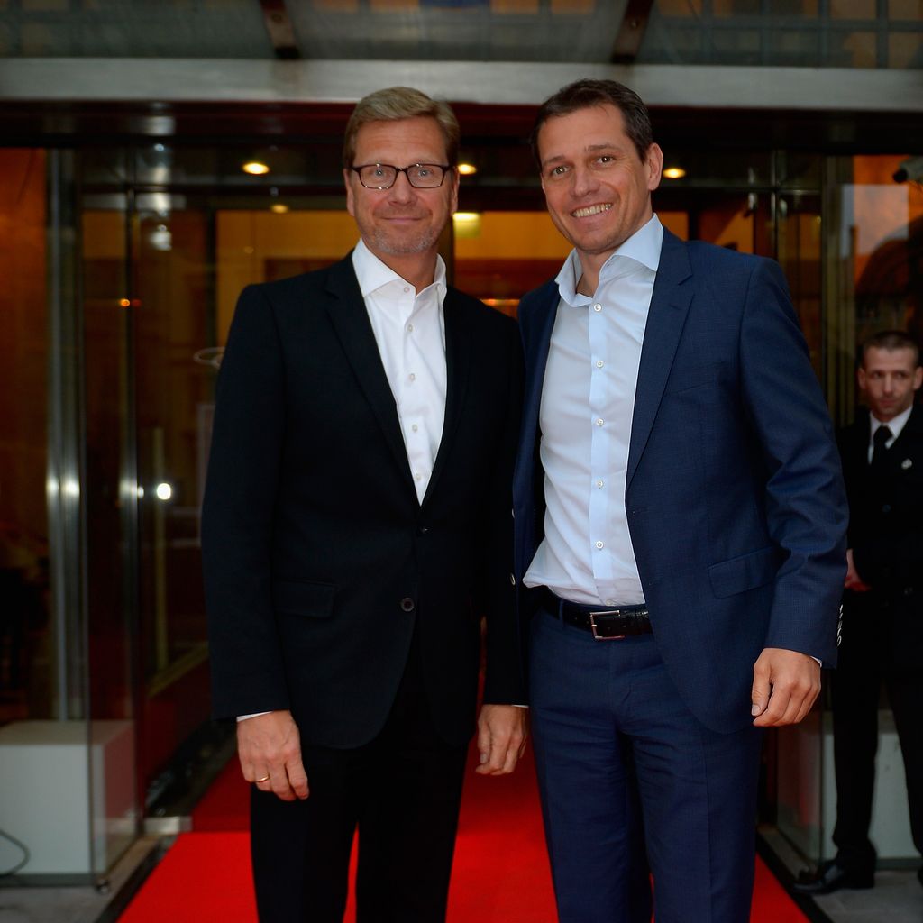 Guido Westerwelle und Michael Mronz bei der BMW Players Night in München, April 2014