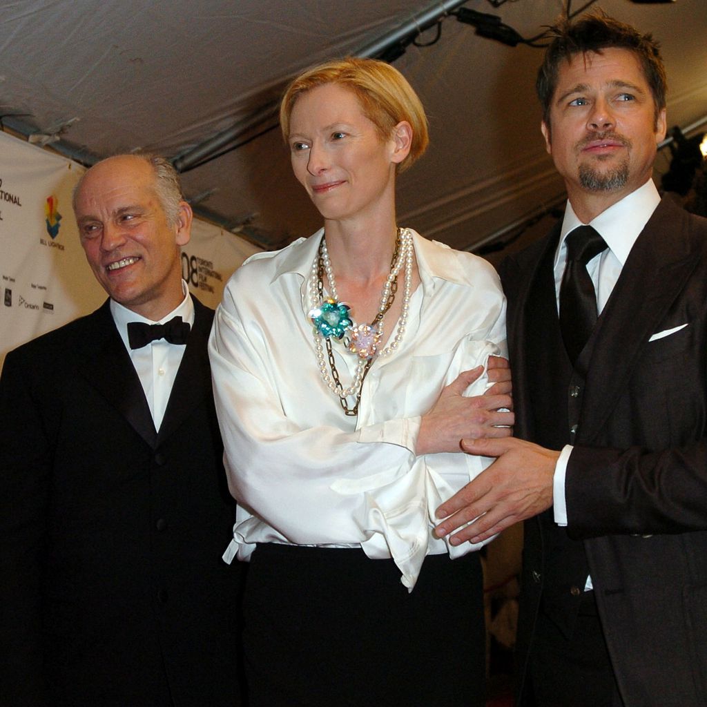 John Malkovich mit Tilda Swinton und Brad Pitt bei der Premiere von "Burn After Reading"
