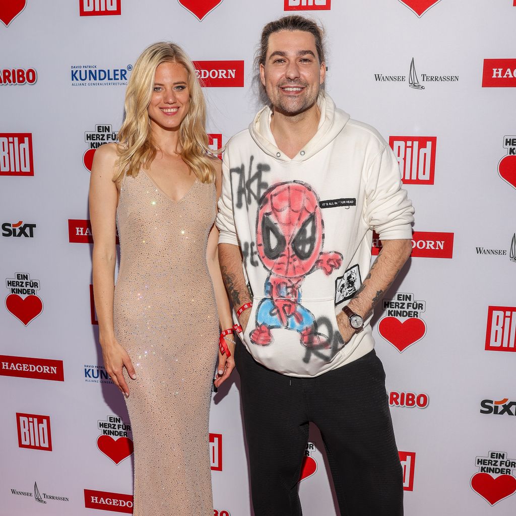 Larissa Marolt und David Garett beim Sommerfest von "Ein Herz für Kinder", Juni 2025