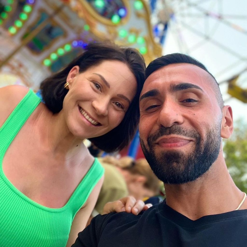 MoTrip (r.) und seine Frau Larissa im Juli 2022