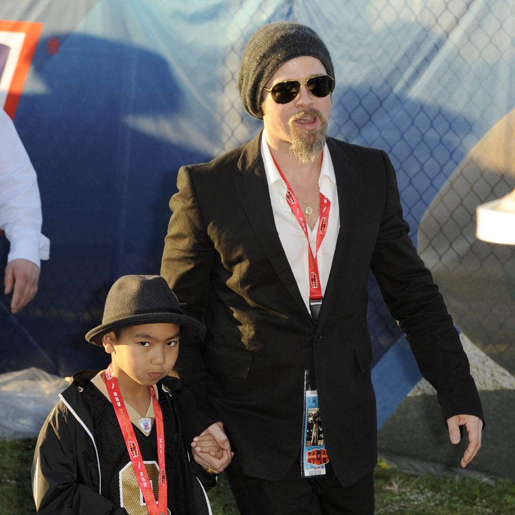Maddox Jolie-Pitt und Brad Pitt, Februar 2010