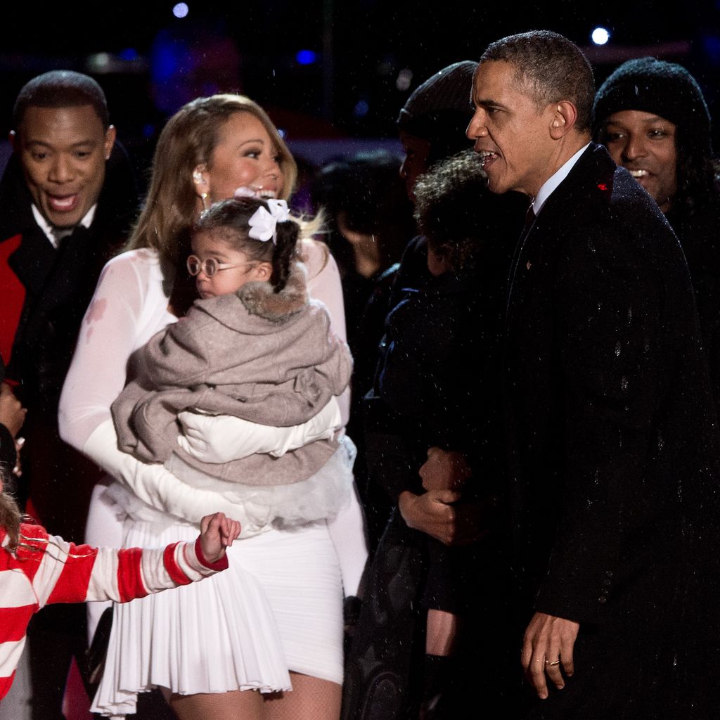 Mariah Carey mit ihrer Tochter Monroe und Barack Obama 2013