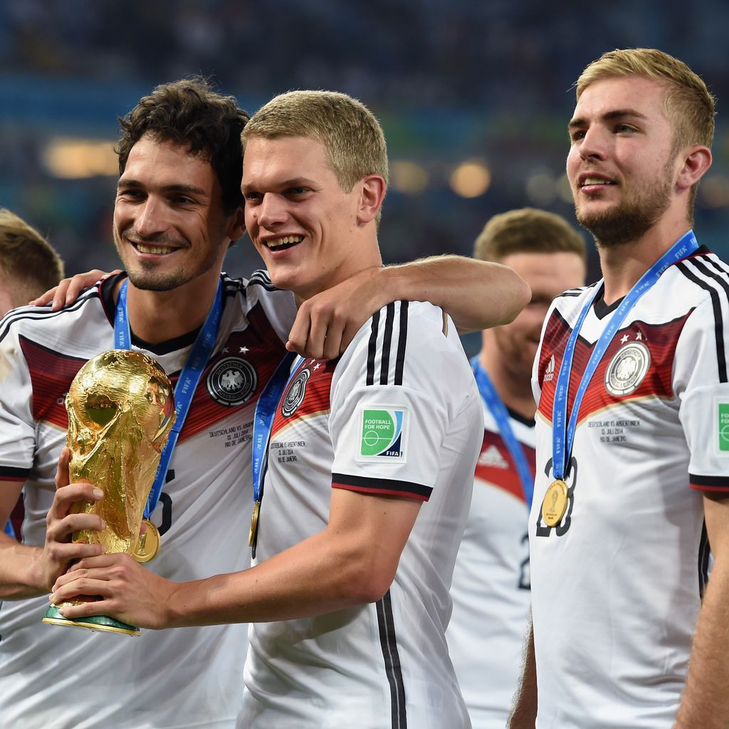 Mats Hummels, Matthias Ginter und Christoph Kramer nach dem WM-Sieg 2014