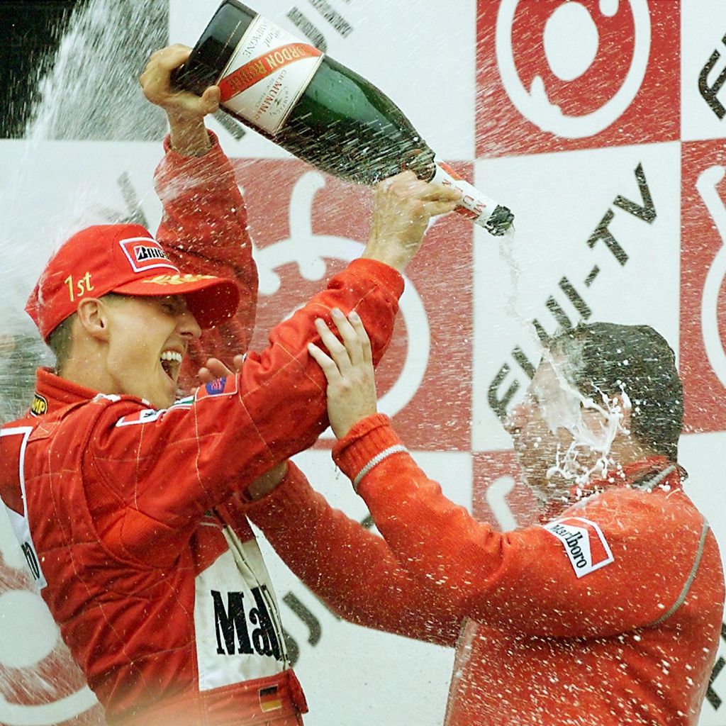 Michael Schumacher und Jean Todt in Suzuka 2000