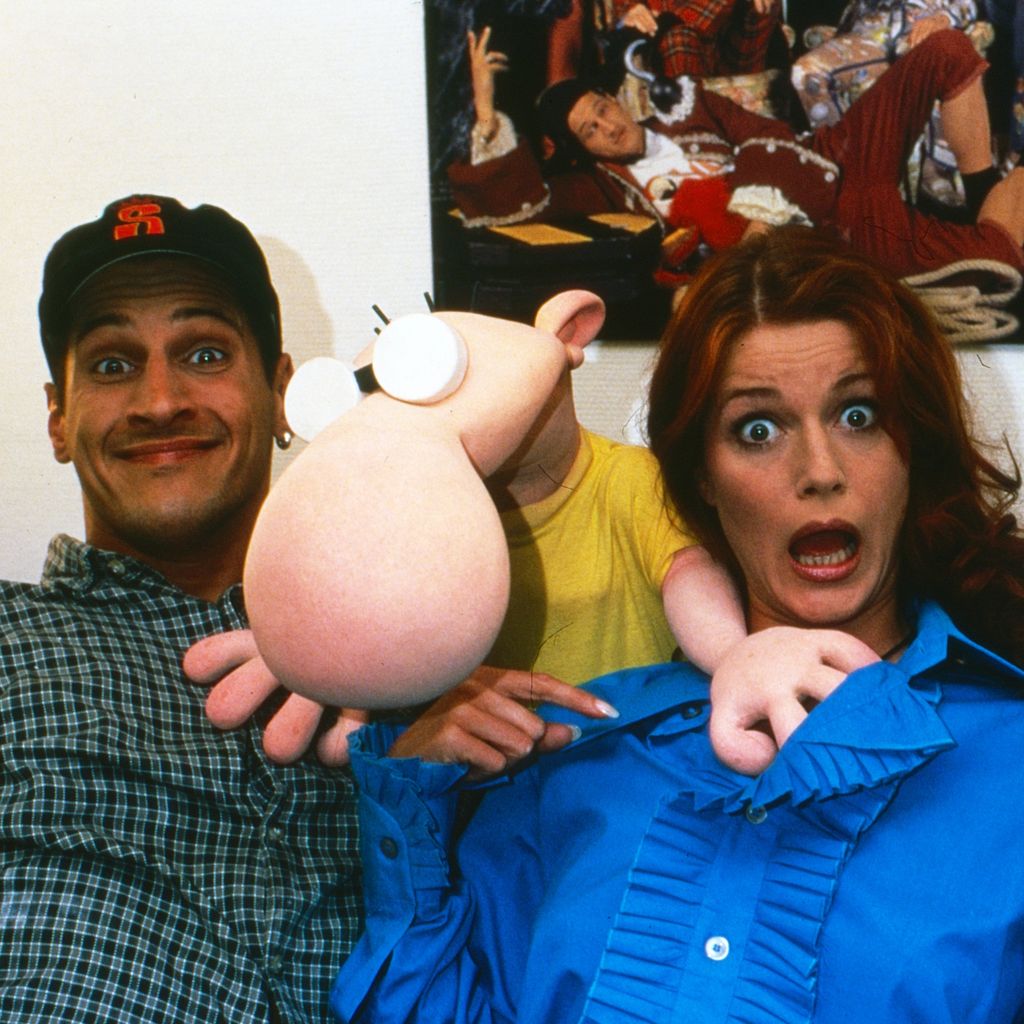 Mirco Nontschew und Esther Schweins mit der Comicfigur "Kleines Arschloch", 1997
