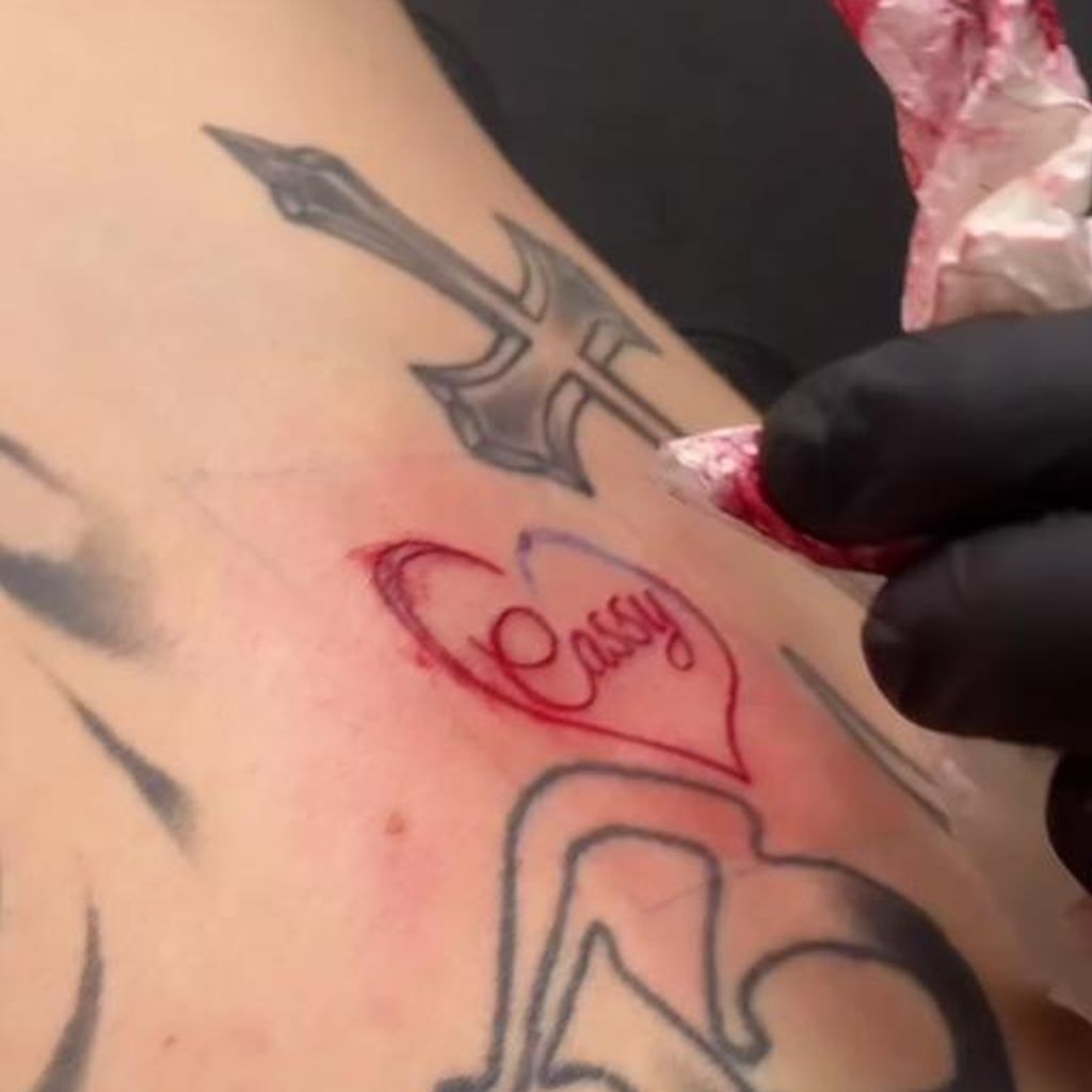 Partnertattoo von Cassy Cassau und Coach Bennet