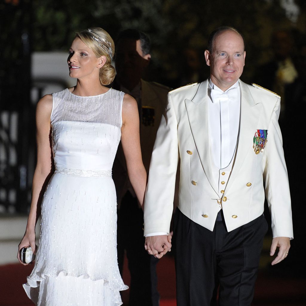 Fürstin Charlène und Fürst Albert von Monaco nach ihrer kirchlichen Trauung im Jahr 2011