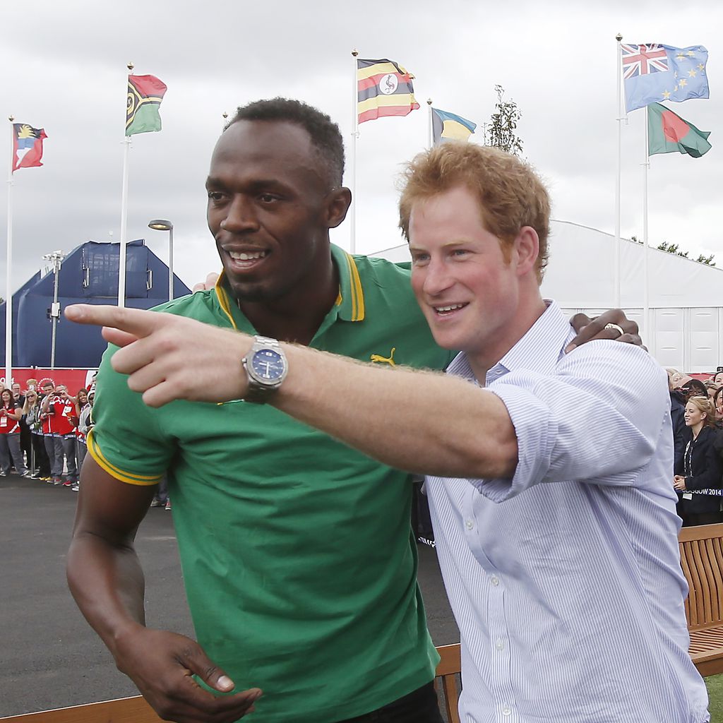 Usain Bolt und Prinz Harry 2014 in Schottland