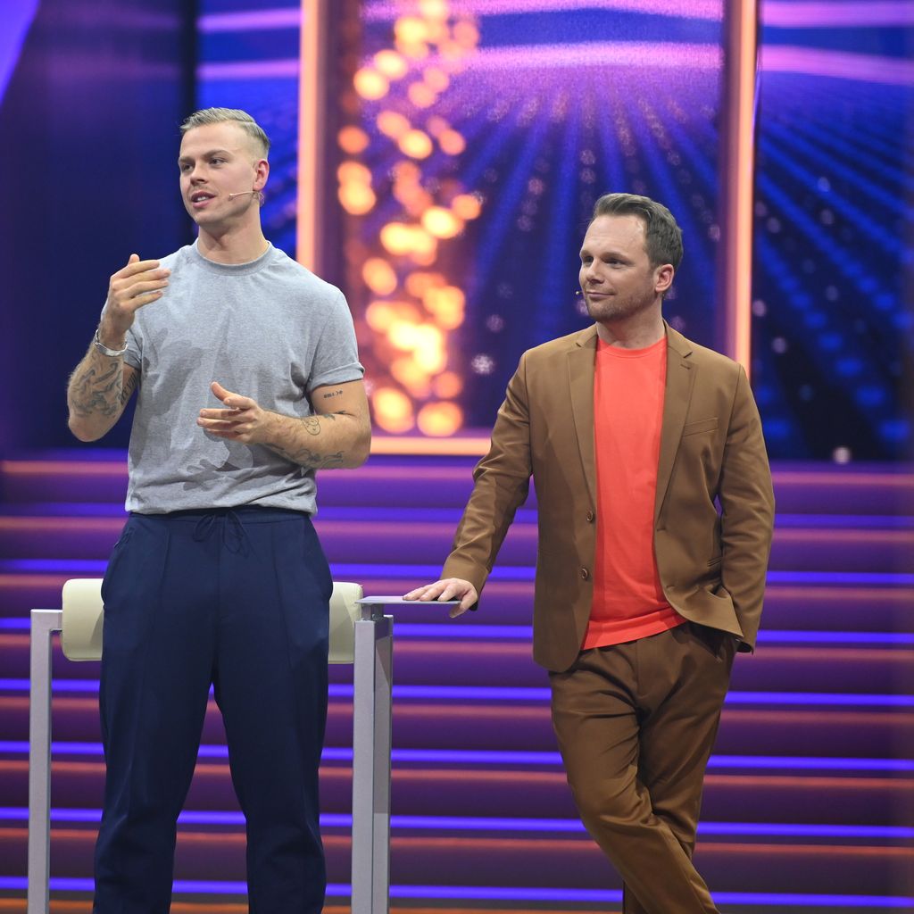 Ralf Schmitz (R.) und Kandidat Alex bei "Rate my Date"