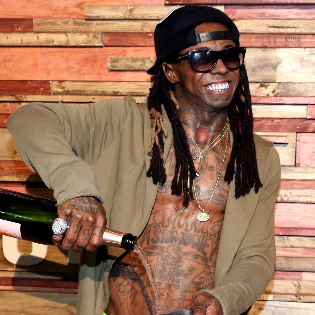 Lil Wayne mit Sonnenbrille und Cap