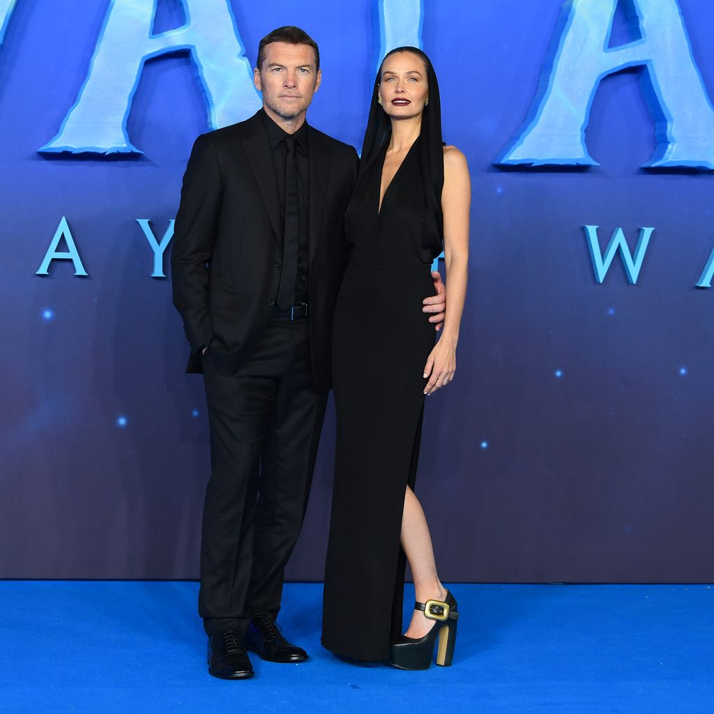 Sam Worthington und seine Frau Lara Bingle bei der "Avatar 2"-Weltpremiere, 2022