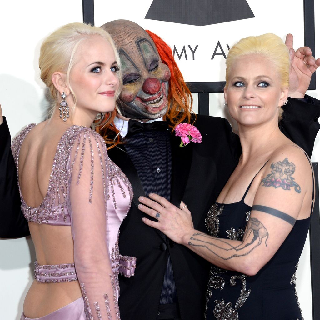 Shawn "Clown" Crahan (mitte) mit seiner Tochter Gabrielle (links) und Ehefrau Chantel (rechts)