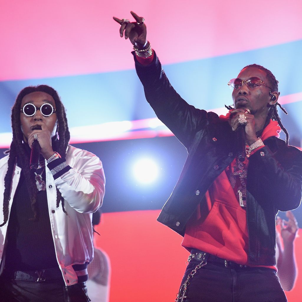 Takeoff und Offset mit ihrer Band Migos auf der Bühne