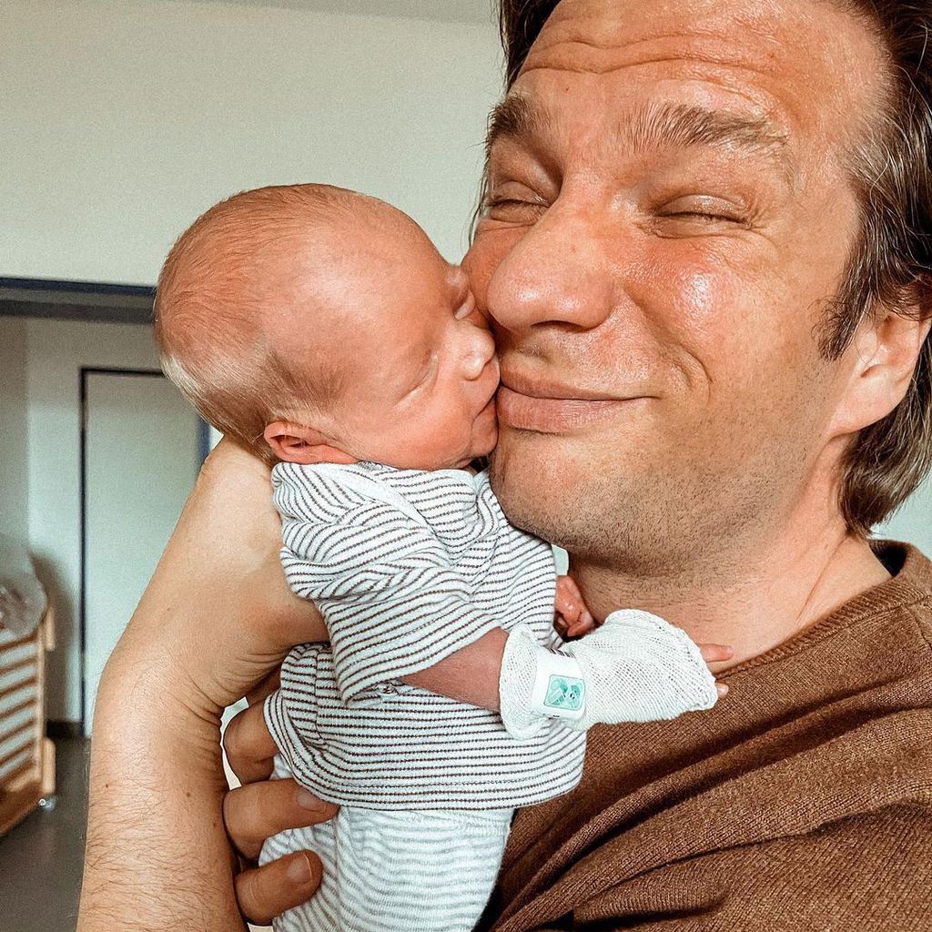 Tanja Szewczenkos Mann Norman mit seinem Sohn