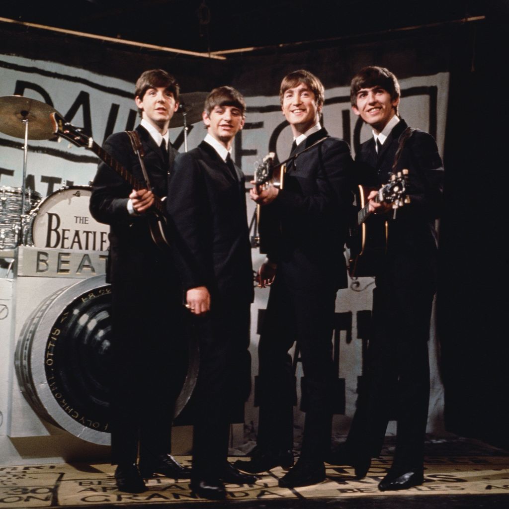 The Beatles bei einem Auftritt in Manchester 1963