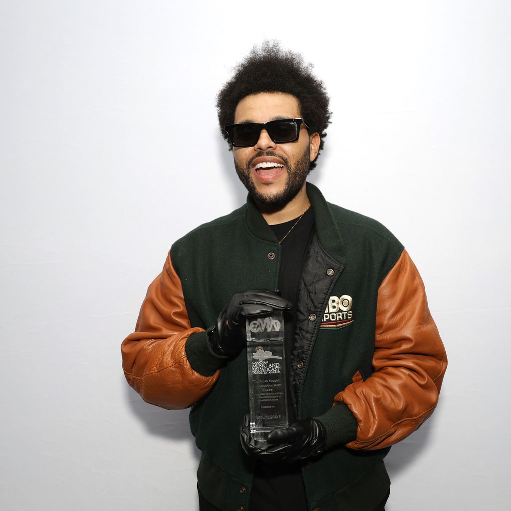 The Weeknd mit seinem Allan Slaight Humanitarian Award