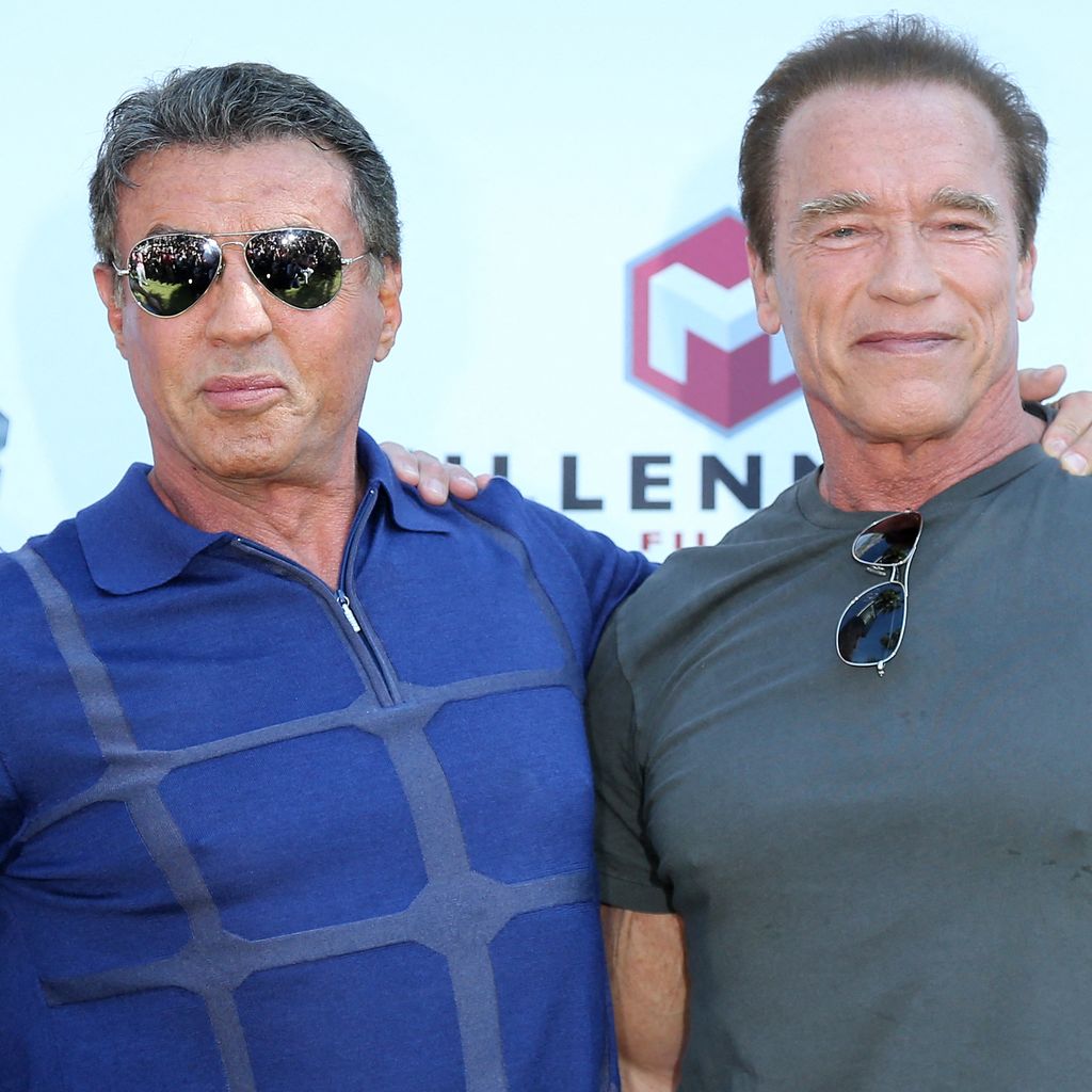 Zwei Personen posieren beim Fototermin zum Film "The Expendables 3" beim Filmfestival von Cannes 2014