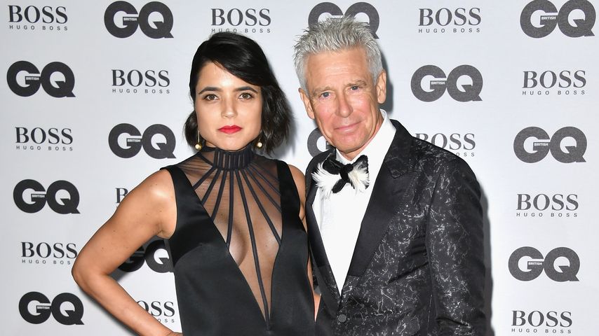 Adam Clayton und Mariana Teixeira De Carvalho