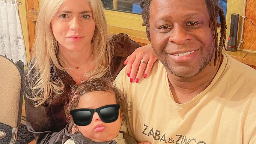 Adelina Zilai und Mola Adebisi mit ihrem Sohn, Dezember 2024