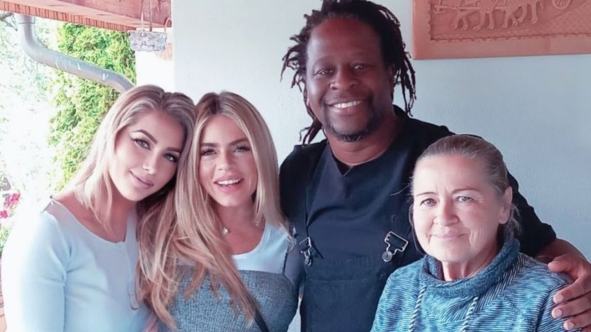 Adelina Zilai und Mola Adebisi mit ihrer Familie, im Juni 2024