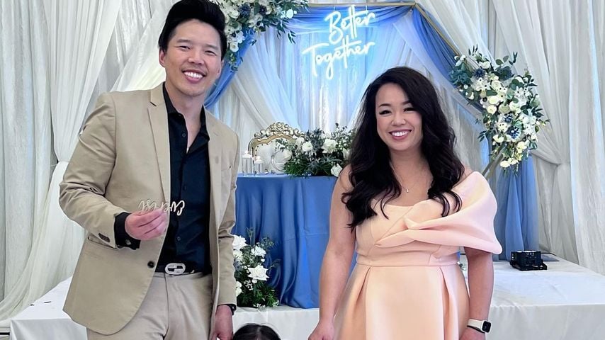 Alex Duong mit seiner Frau und seiner Tochter, Juni 2023