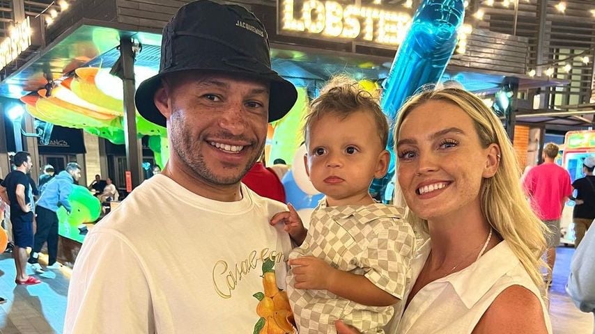 Alex Oxlade-Chamberlain und Perrie Edwards mit ihrem Sohn