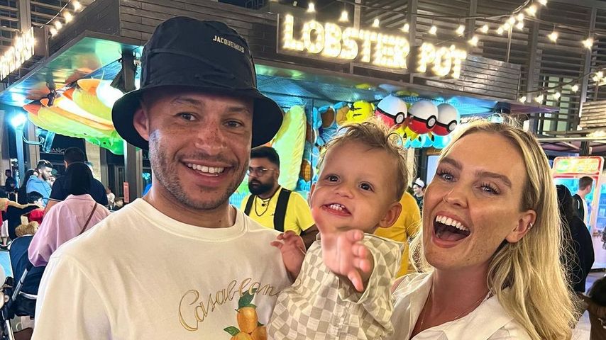 Alex Oxlade-Chamberlain und Perrie Edwards mit ihrem Sohn