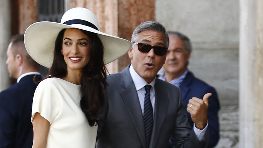 Amal und George Clooney auf dem Weg zu ihrer Hochzeit im September 2014 in Venedig