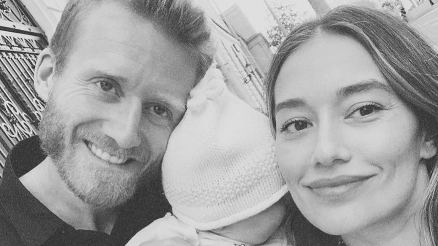 André und Anna Schürrle mit ihrer Tochter Kaia