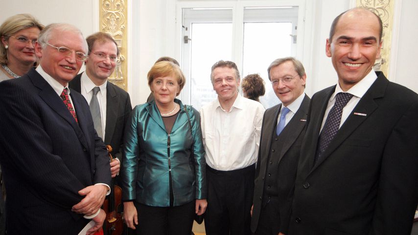 Angela Merkel (m.l.) und Mariss Jansons (m.r) im Januar 2006