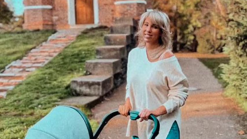 Annemarie Eilfeld mit ihrem Kinderwagen