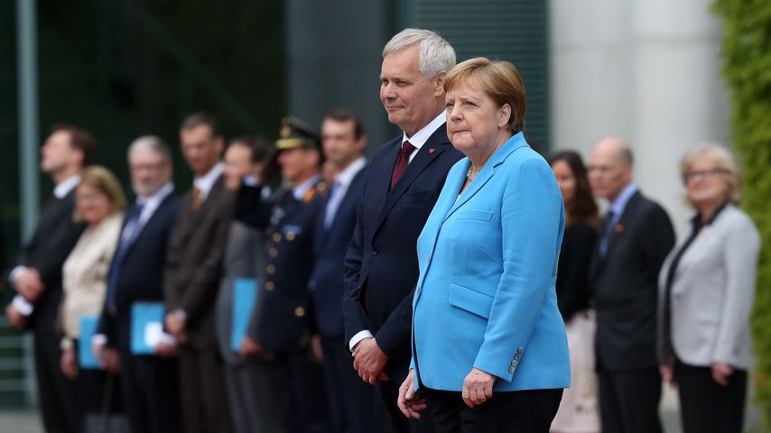 Antti Rinne und Angela Merkel