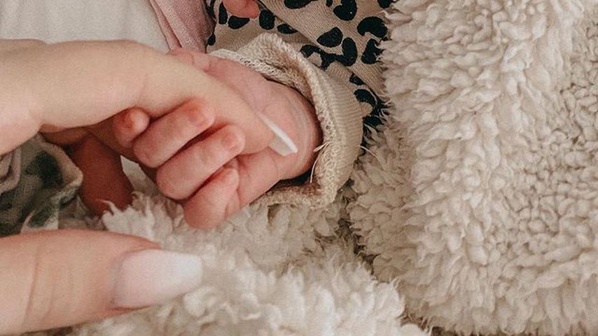 Aurels Verlobte Alena mit der gemeinsamen Tochter Mara
