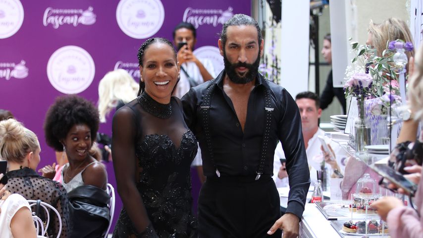 Barbara Becker und Massimo Sinató bei der Lascana Show in Berlin